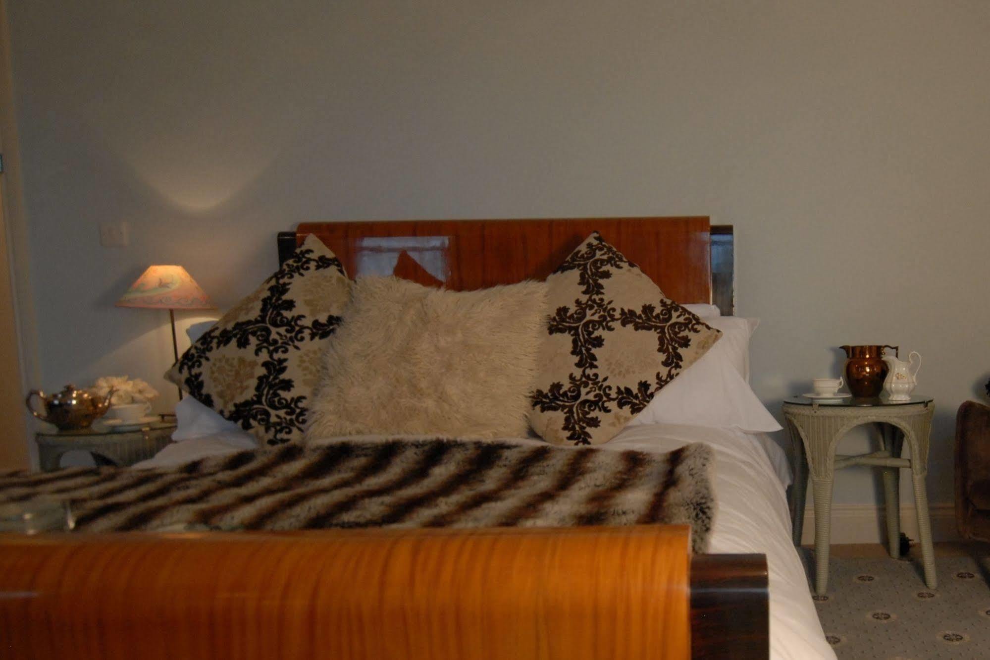The Bower Inn Bridgwater Exterior photo A bed with a mink throw